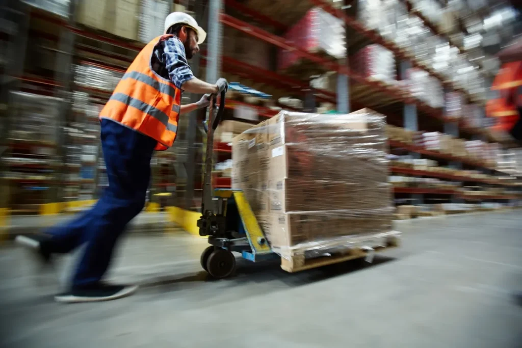Packaging pallets being moved for delivery and distribution