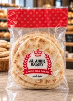 Custom printed clear bakery bread bag with red header holding large pita bread – custom printed packaging by Texas Food Pack