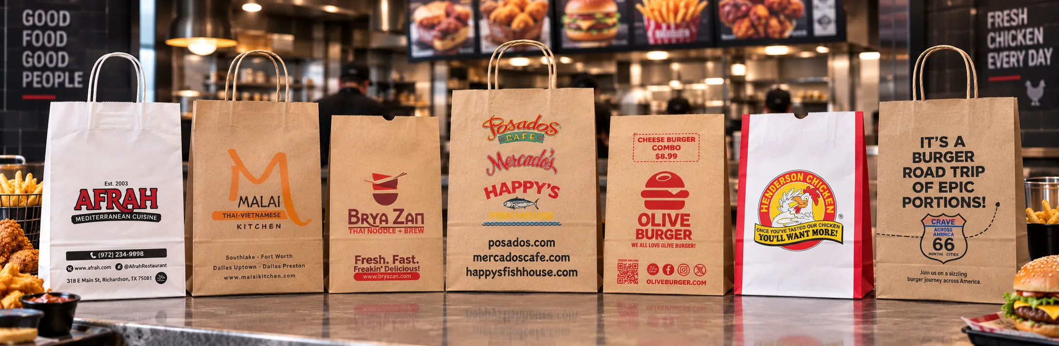 Custom printed paper takeout bags in a commercial kitchen – custom printed packaging by Texas Food Pack